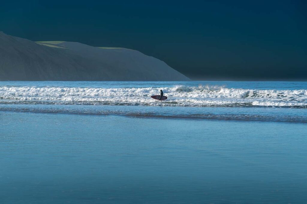 MFIMAGE Portfolio. A surfer at Putsborough, North Devon